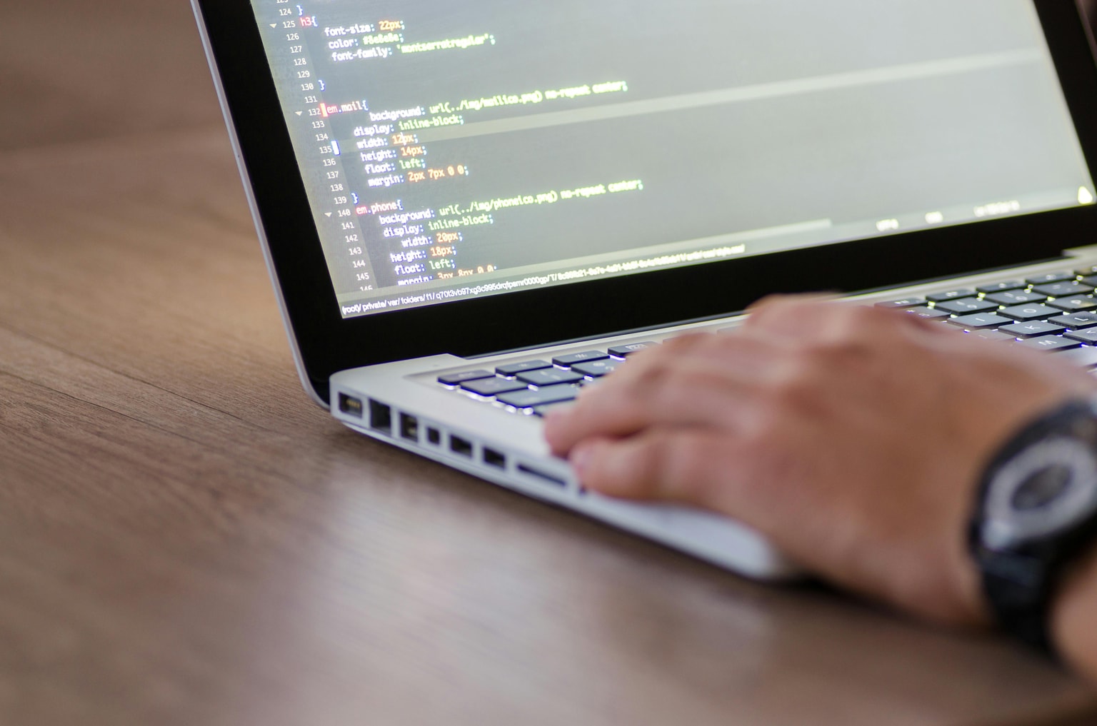 Laptop showing website development work